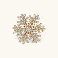 Geometric snowflake brooch with 14K gold-plated copper setting and clear zirconia crystals arranged in radiating pattern.